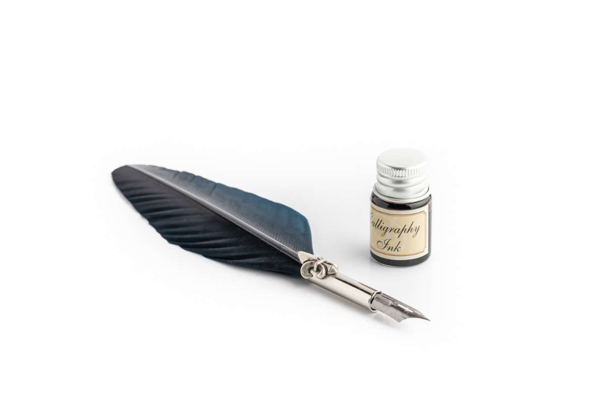 PIU68 Writing set with medium coloured feather pen, lily decorated ferrule & black ink