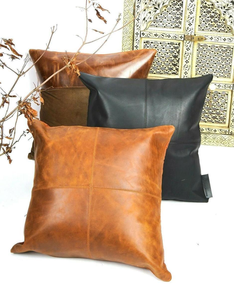 GENUINE LEATHER TAN CUSHION.