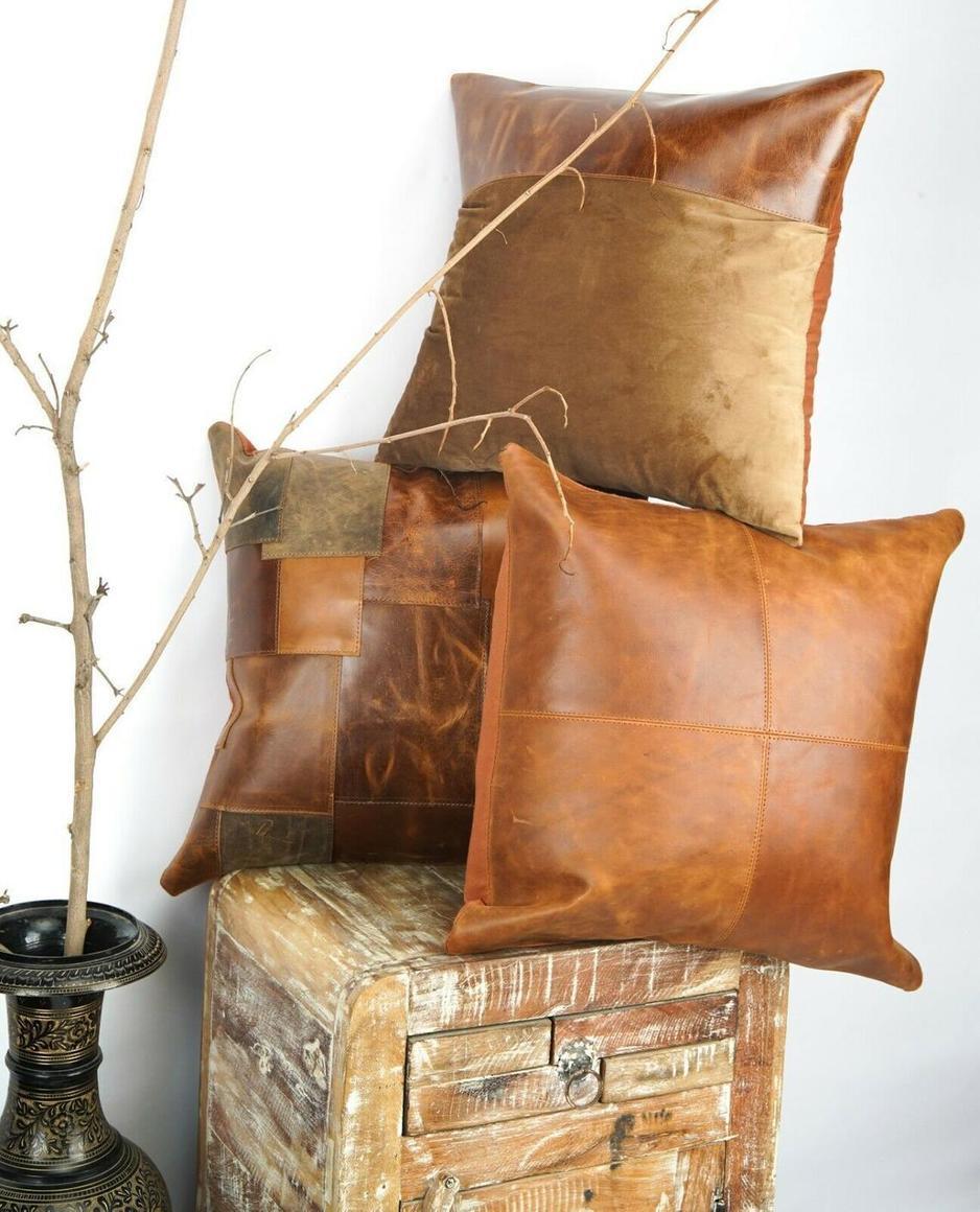 GENUINE LEATHER TAN CUSHION.