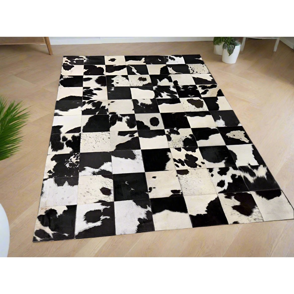 Checkerboard Cowhide Patchwork Rug – Handcrafted Natural Leather