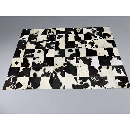 Checkerboard Cowhide Patchwork Rug – Handcrafted Natural Leather