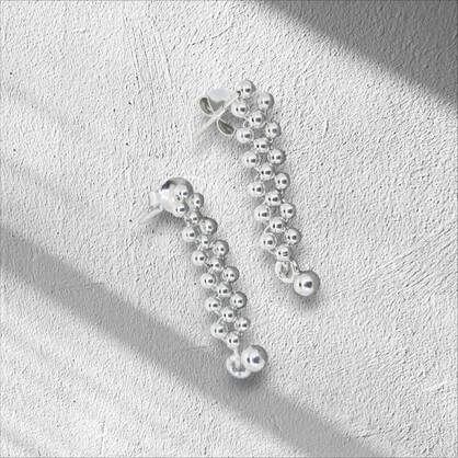 Sterling silver plaited drop stud earrings, adorned with petite balls that sway with every movement.