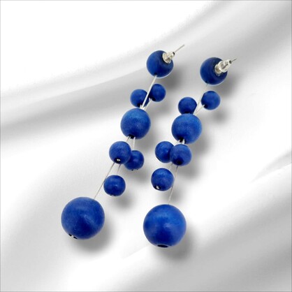 Blue wooden balls in elongated stud earrings. Nickel & lead free.