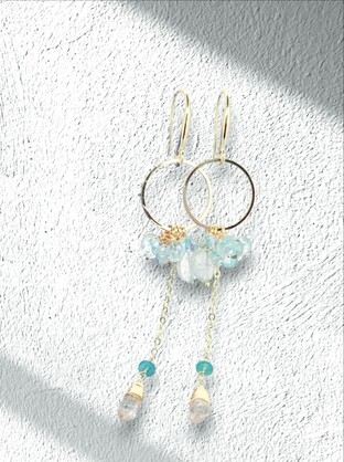 Gold-Plated Metal elongated Dangle Earrings adorned with petite blue stones for a touch of feminine beauty