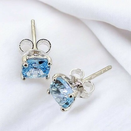 Blue Topaz Claw Stud in Sterling Silver