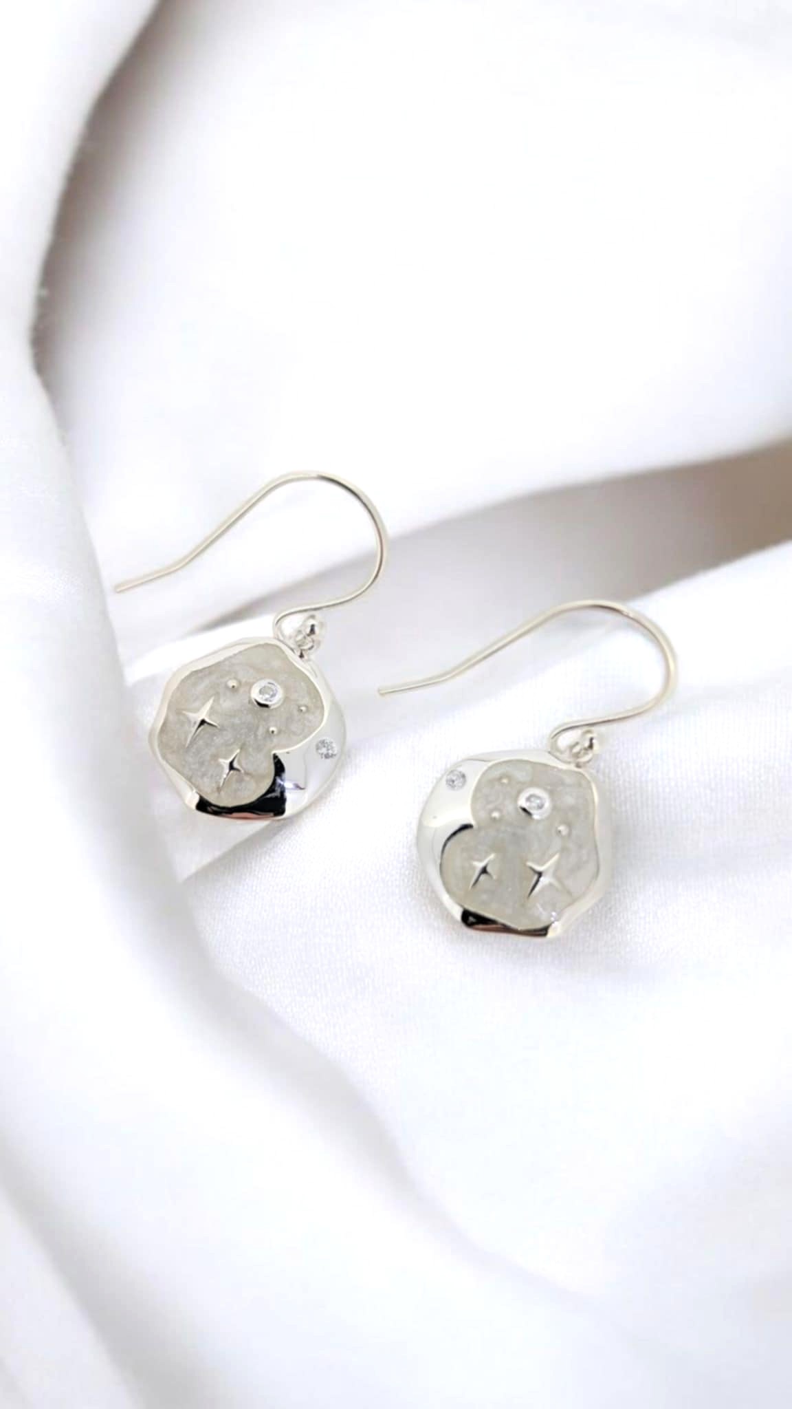 Sterling Silver Swirl Resin Drop Earrings with Silver Stars