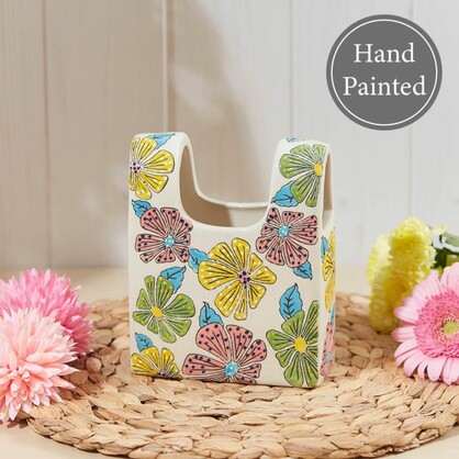 Bright floral handbag shape vase