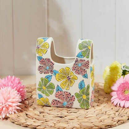 Bright floral handbag shape vase