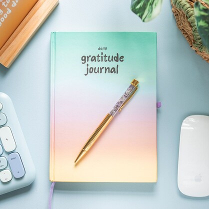 Mindful Moments gratitude journal with amethyst pen