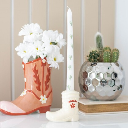 Cowboy boot candle holder with candle