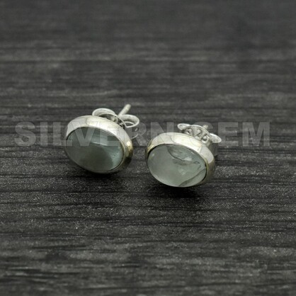 Aquamarine Oval ( 9mm ) Shape Stud in Sterling Silver.