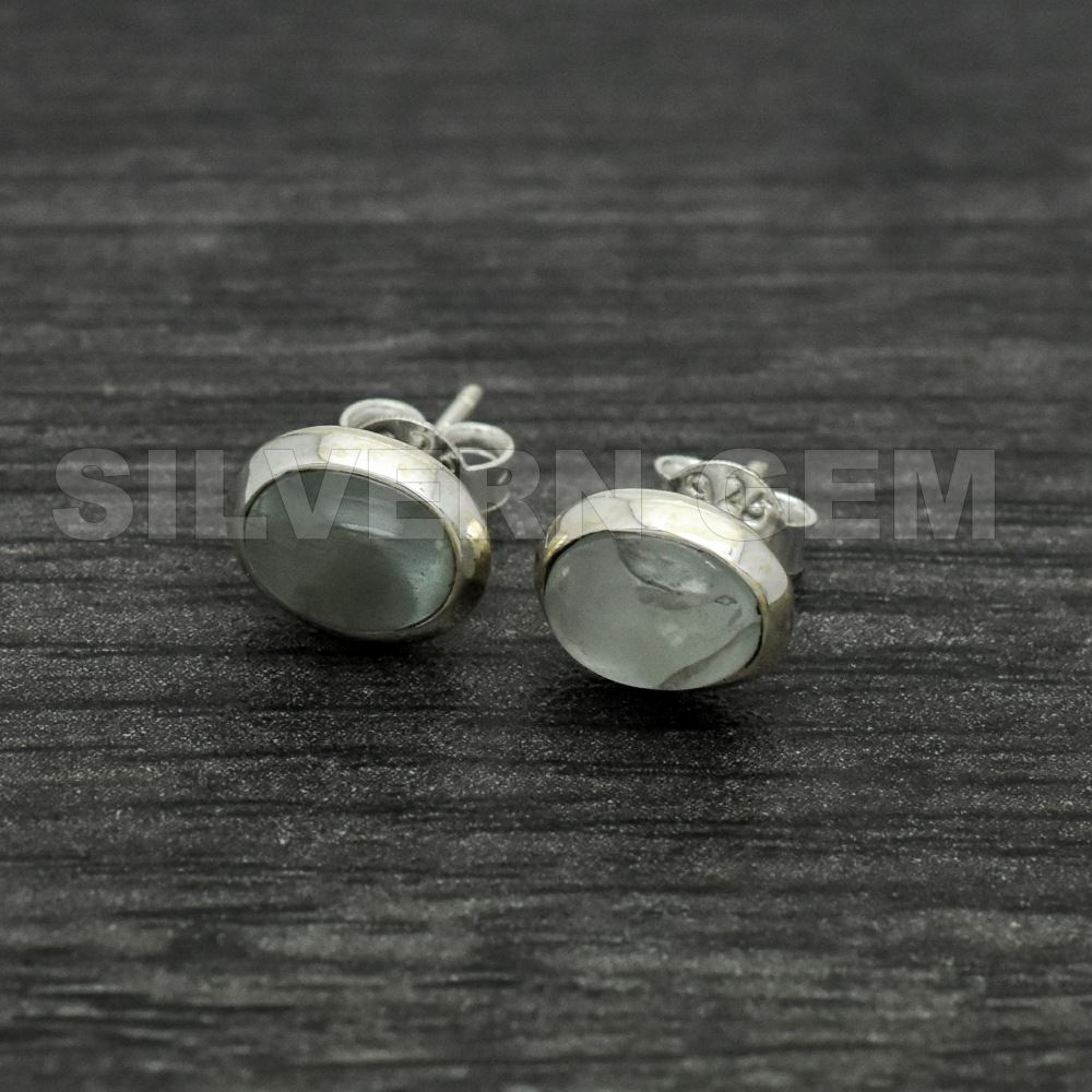 Aquamarine Oval ( 9mm ) Shape Stud in Sterling Silver.