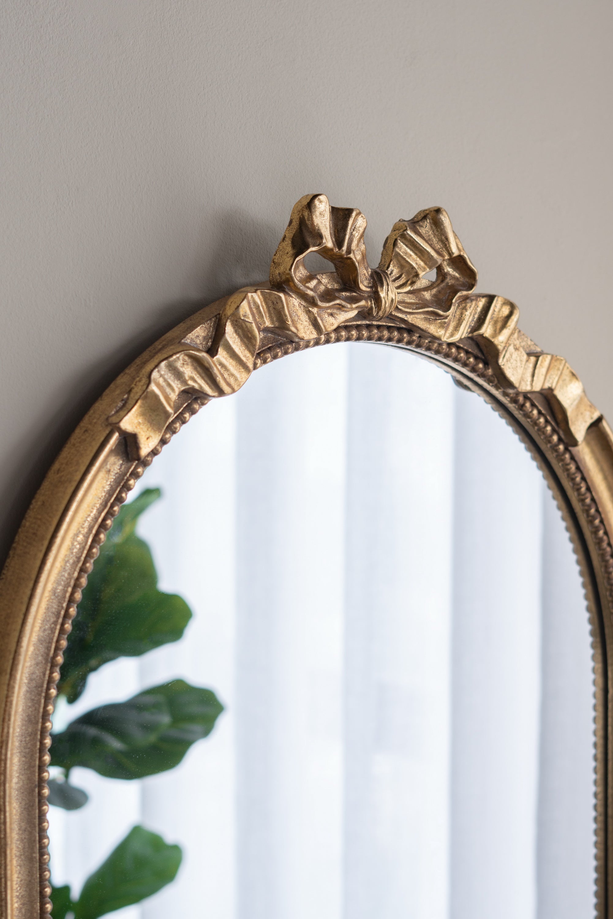 ZURICH ARCHED GOLD BOW MIRROR