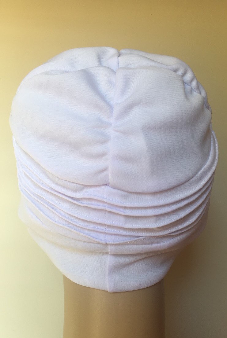 White swim/shower/resort wear cap