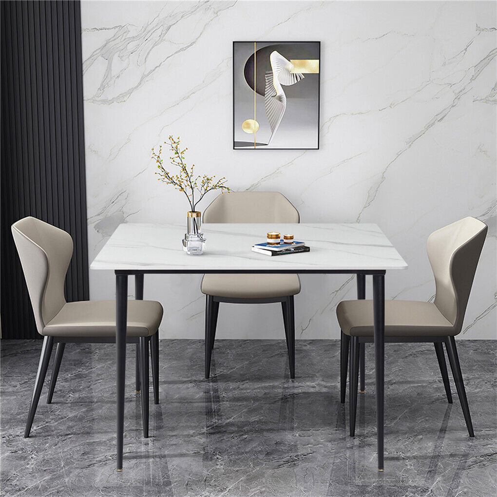 White Sintered Stone Dining Table With Black Legs For Modern Interiors